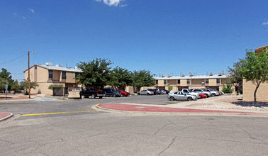 a street with cars parked in a parking lot